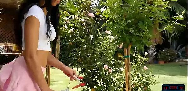  Ebony beauty doing some work in the garden naked